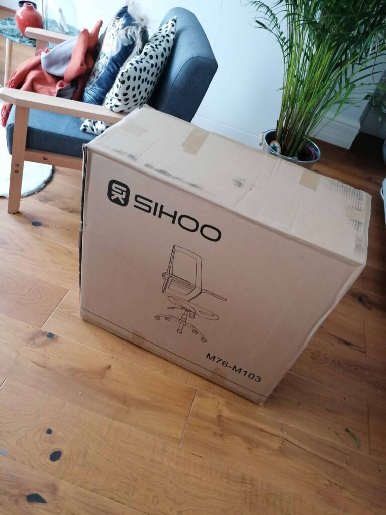 view of small office chair with flip up arms our unboxing package arrival home office