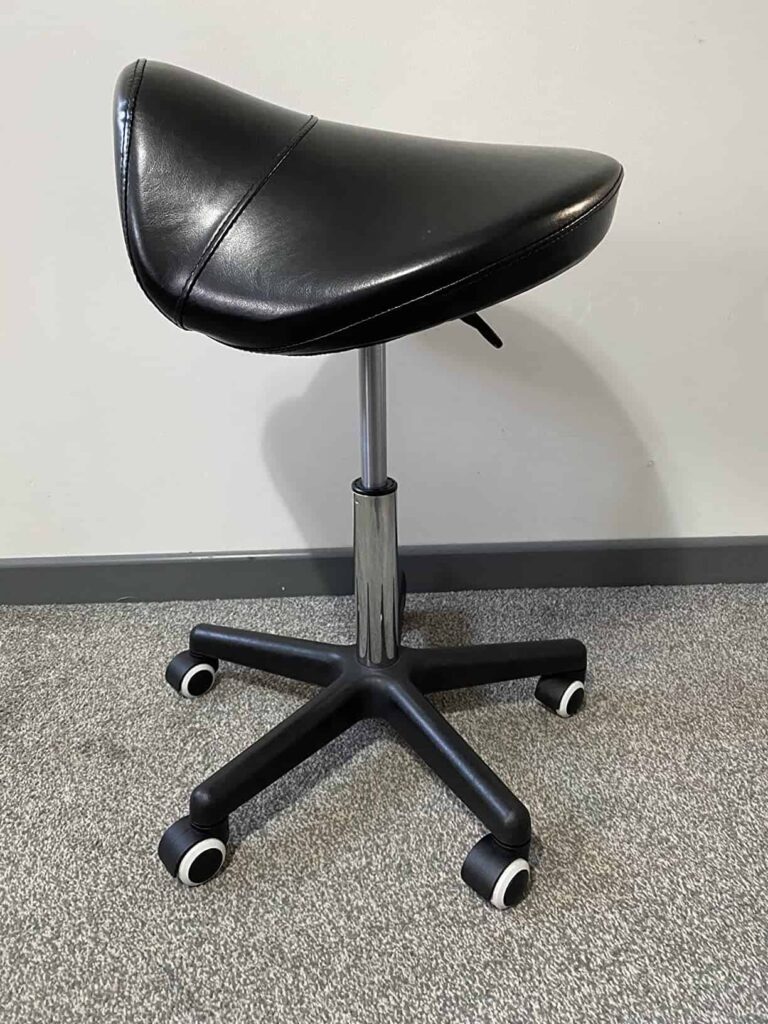 view of our own purchase testing chiro orthopaedic saddle chair for lower back pain unboxing package arrival several weeks to months