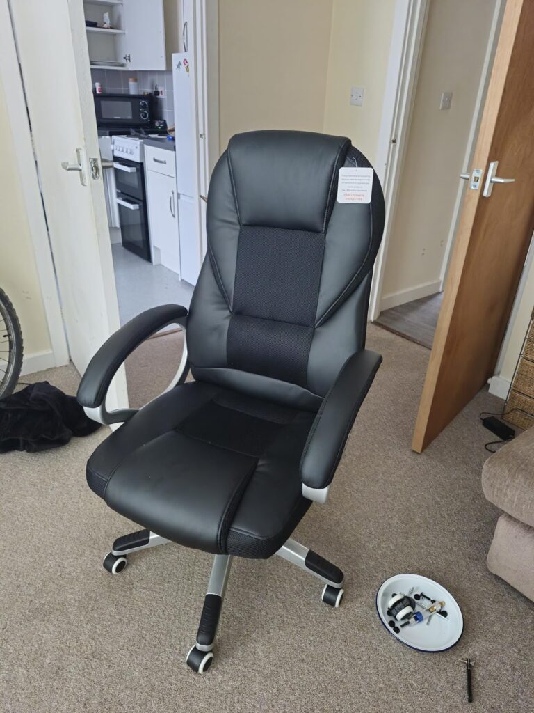 view of our own purchase testing songmics ergonomic office chair under £100 unboxing package arrival several weeks to months 768x1024